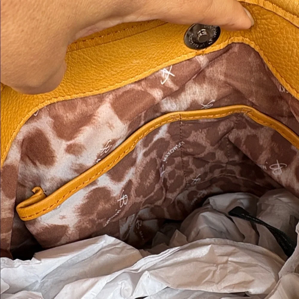 B. Makowsky Orange Hobo Bag